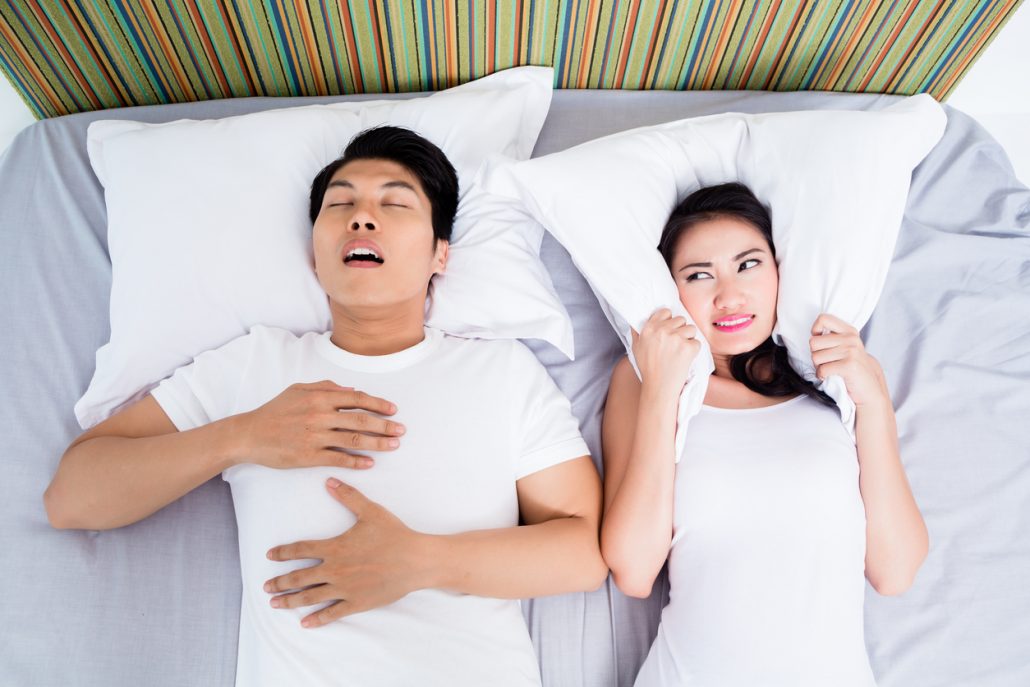 Chinese man snoring keeping his unhappy wife awake